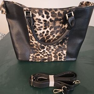 Dasein brand purse with leopard print and black.